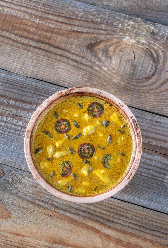 Bowl of yellow curry photo