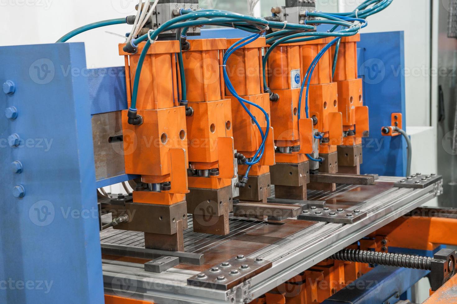 Industrial welding machines in the workshop, in the process of work and movement photo