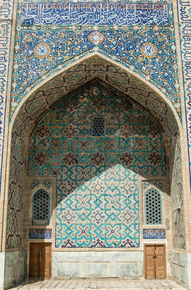 Dome in the form of an arch in traditional Asian mosaic. Details of the architecture of medieval Central Asia photo