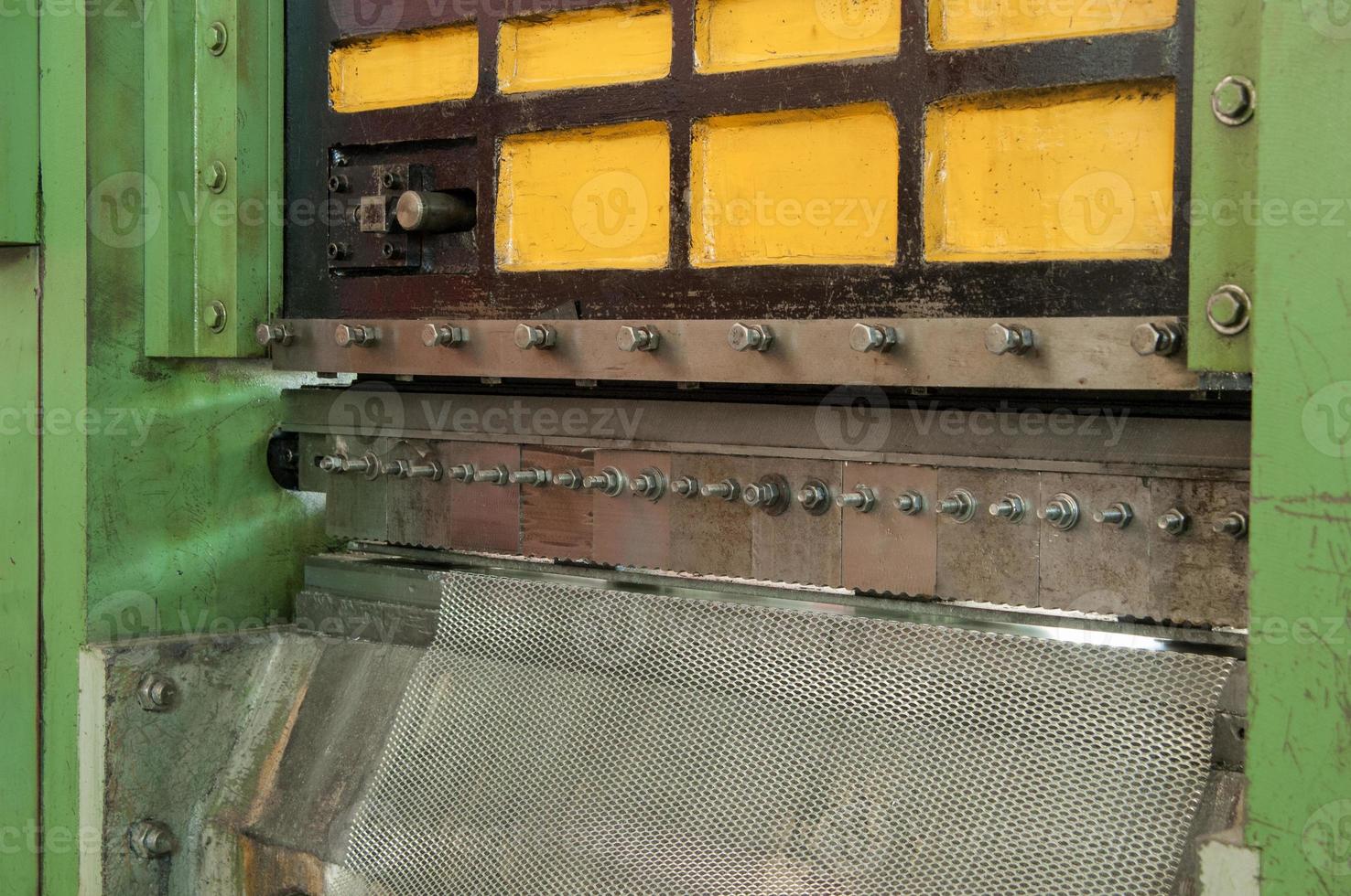 press machine for manufacturing metal mesh for automotive filters. machine for producing metal mesh photo