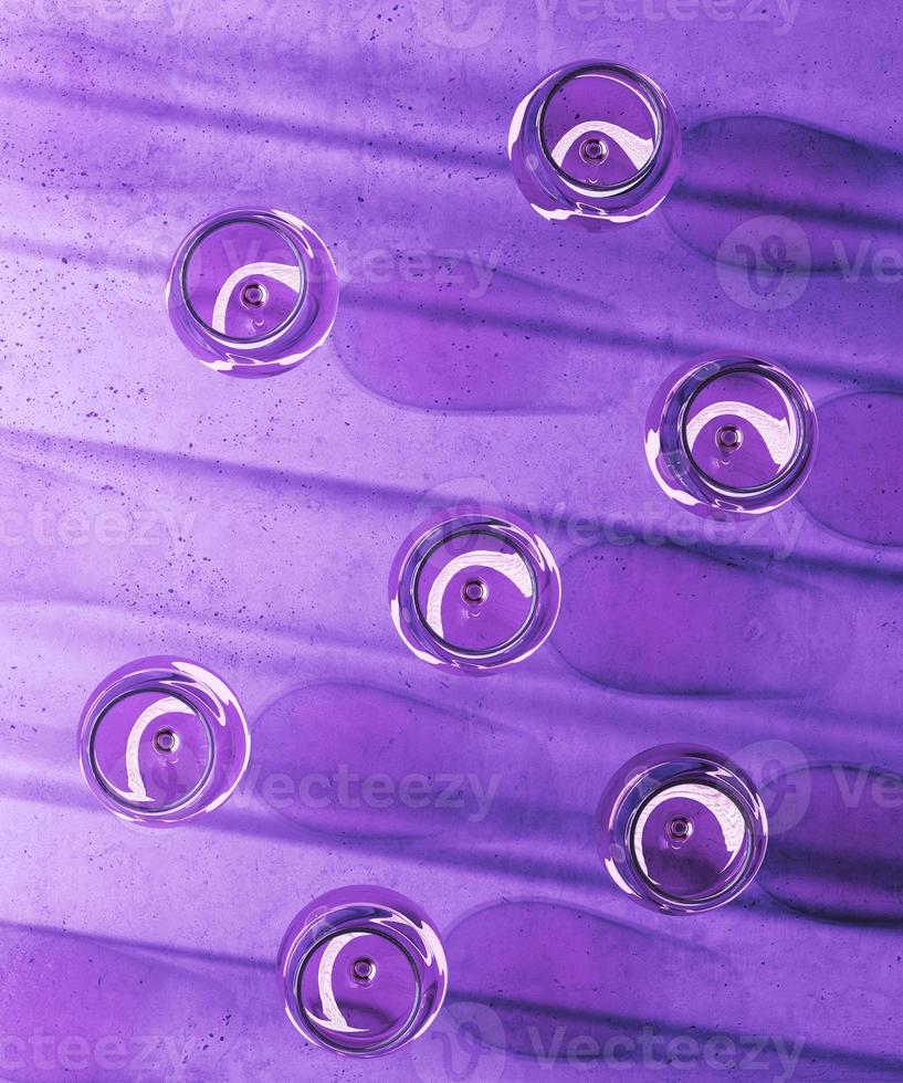 glass of wine is placed on a violet surface. 3d rendering photo