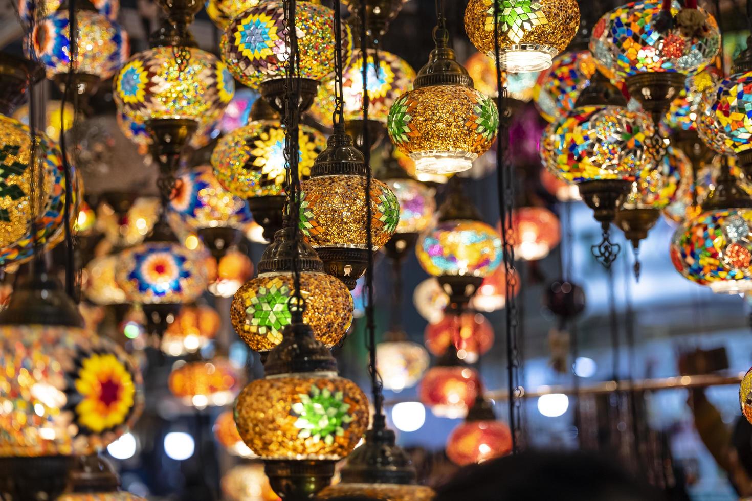 Oriental colorful glass hanging lamps or lanterns artistic selective focus background. photo