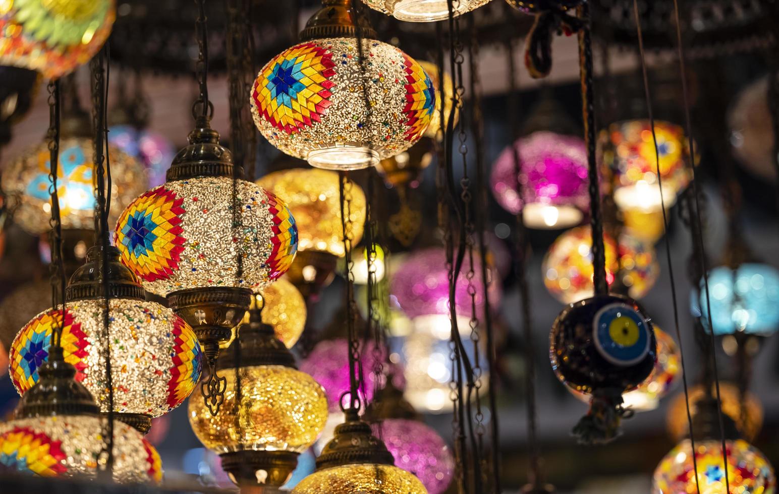 Oriental colorful glass hanging lamps or lanterns artistic selective focus background. photo
