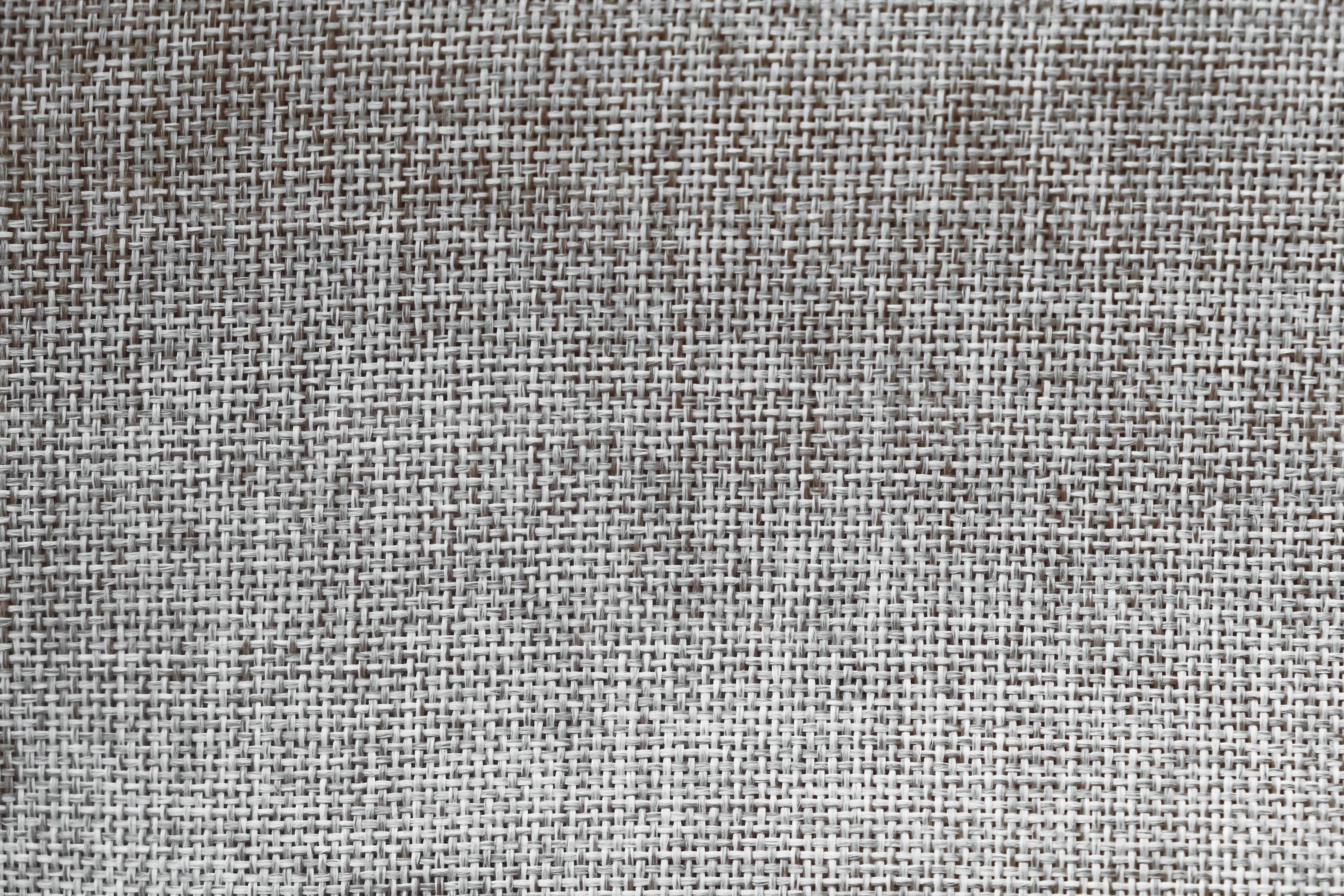 Gray linen fabric as a background texture. Top view. Copy, empty space