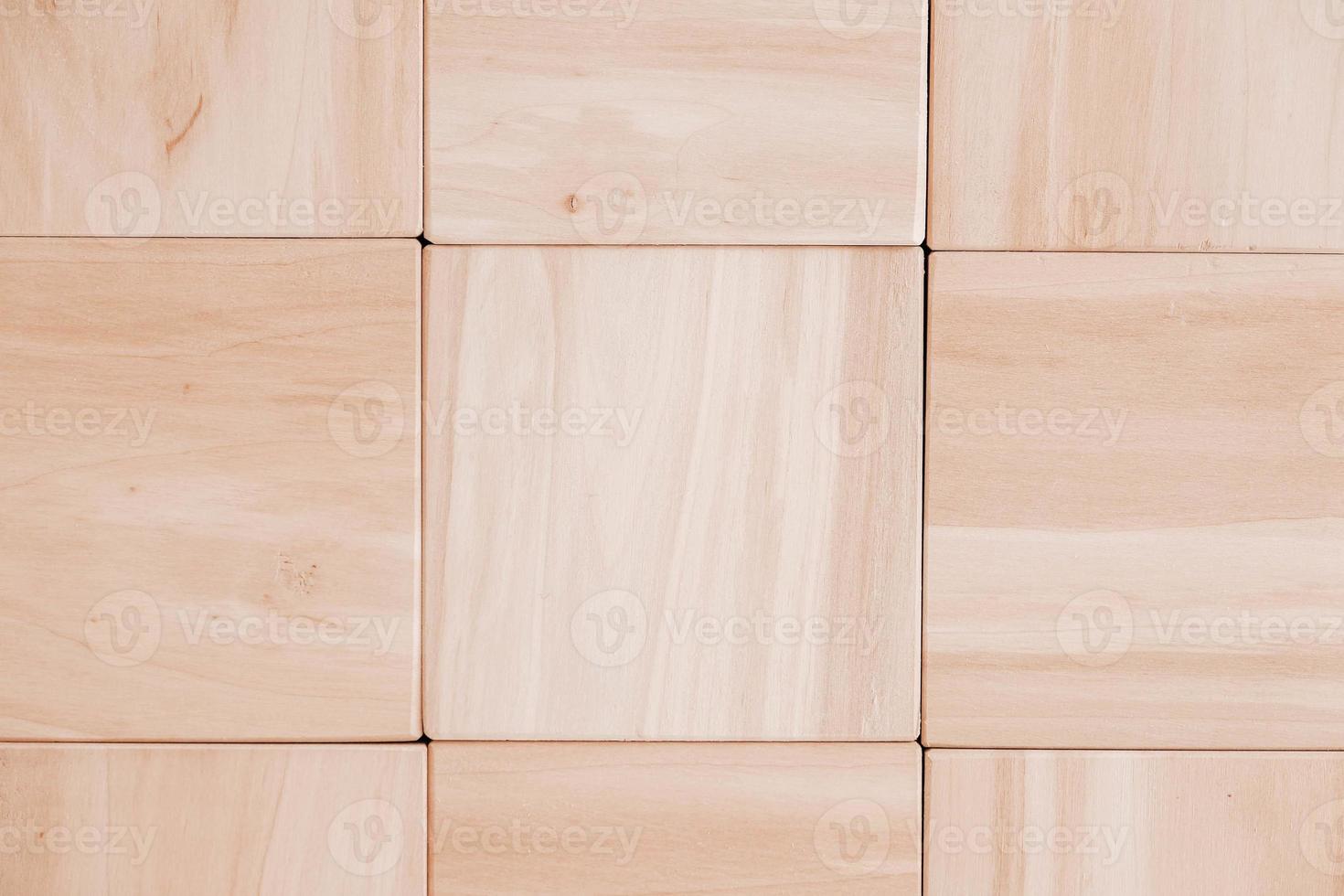 Texture of wooden cubes from natural wood as a background. Copy, empty space for text photo