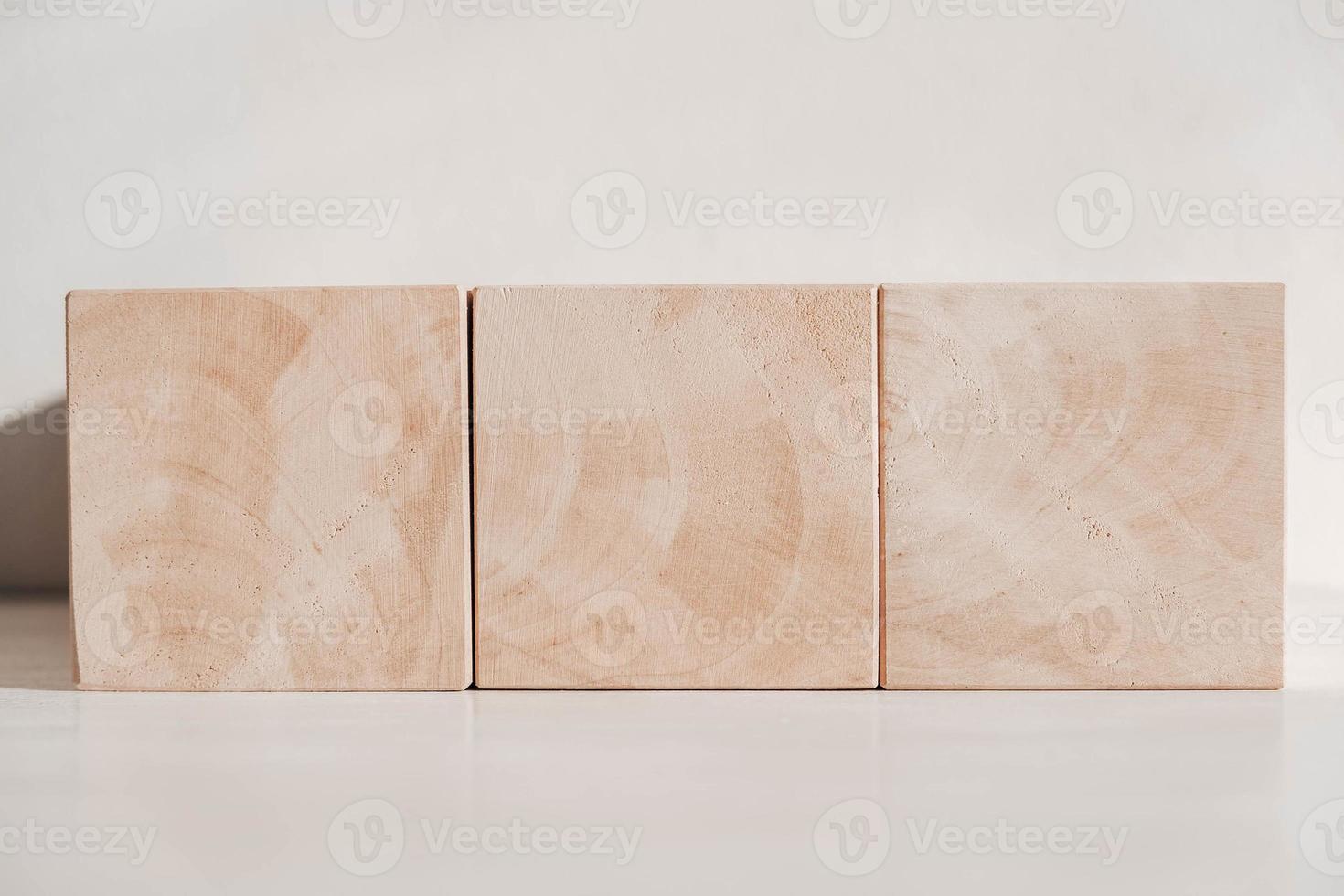 Wooden cubes from natural wood on a white background. Copy, empty space for text photo