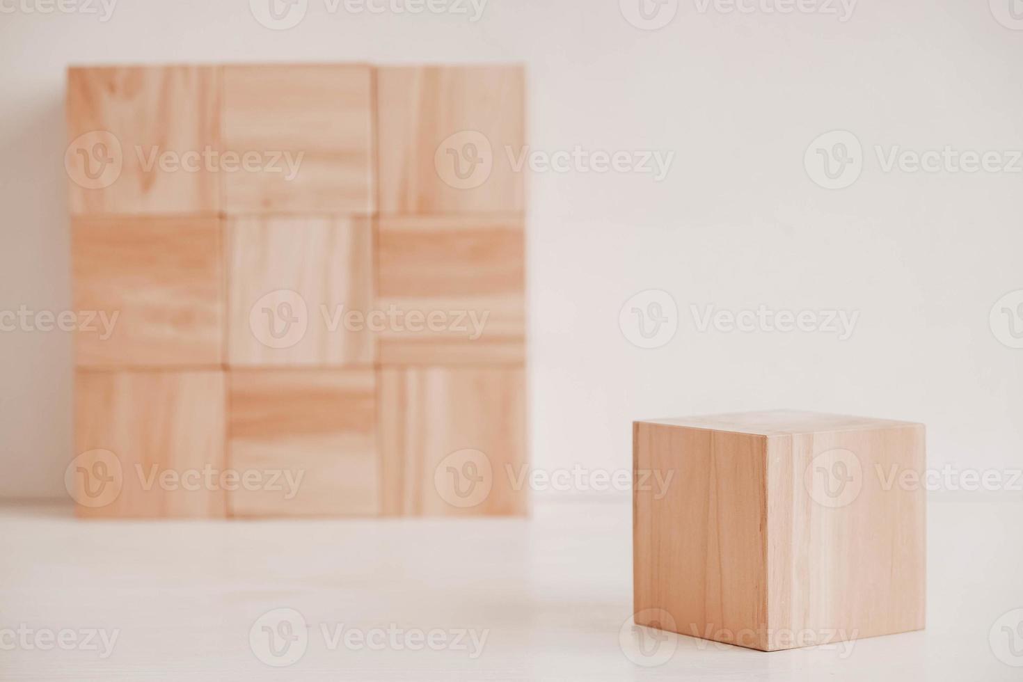 Wooden cubes from natural wood on a white background. Copy, empty space for text photo