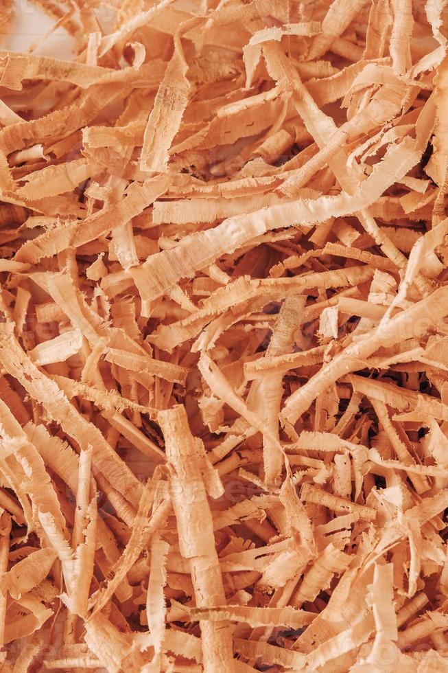 Wood shavings as background texture. Copy, empty space for text photo