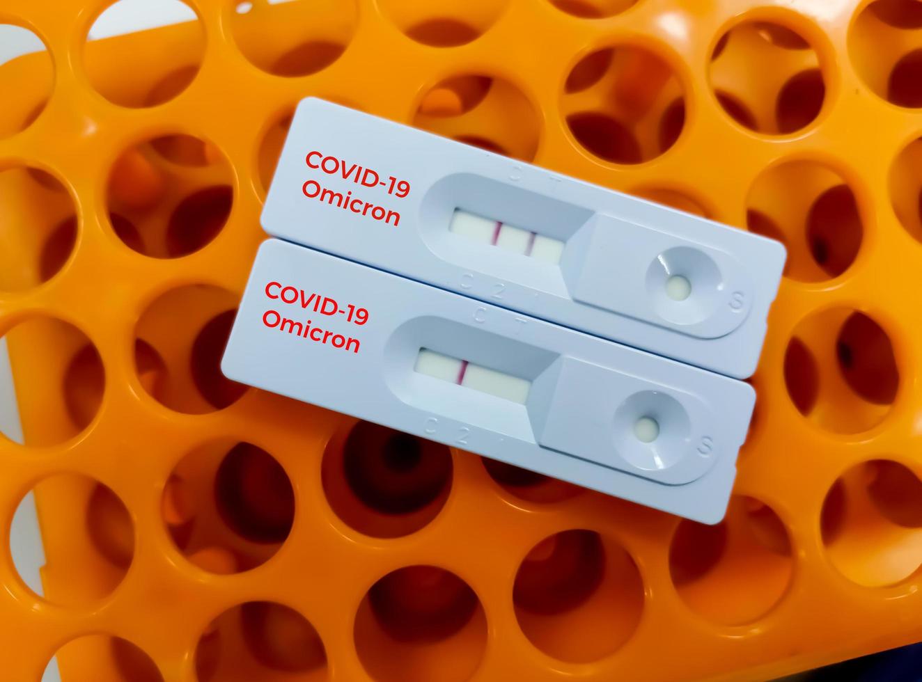 Coronavirus Covid-19 laboratory test result that shows Positive result of Omicron variant. photo