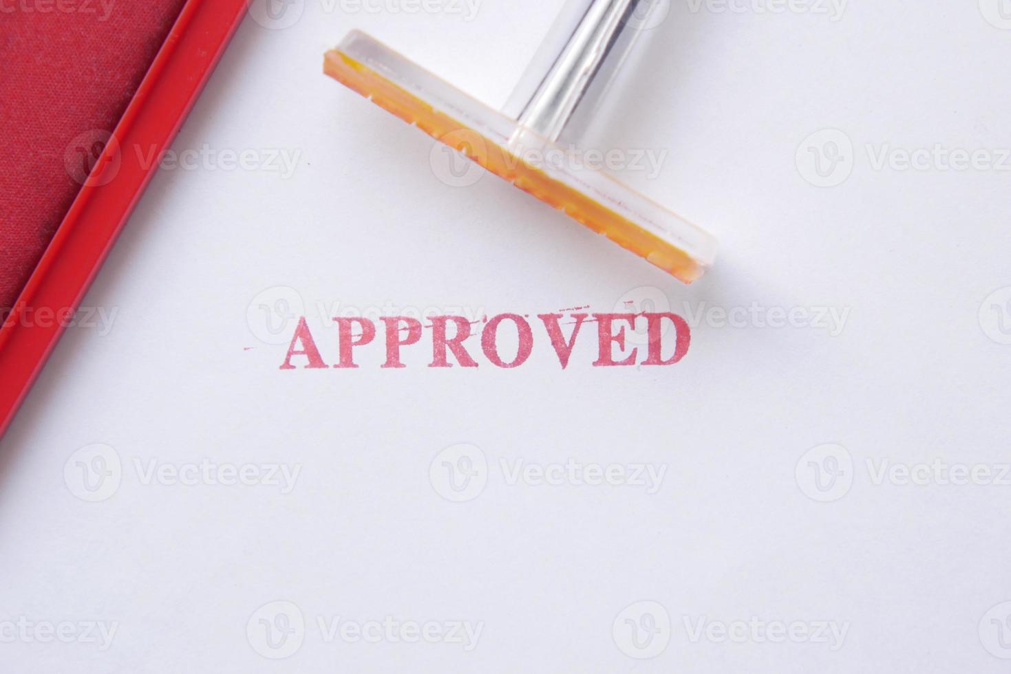 Stamping Document with Approving Contract close up photo