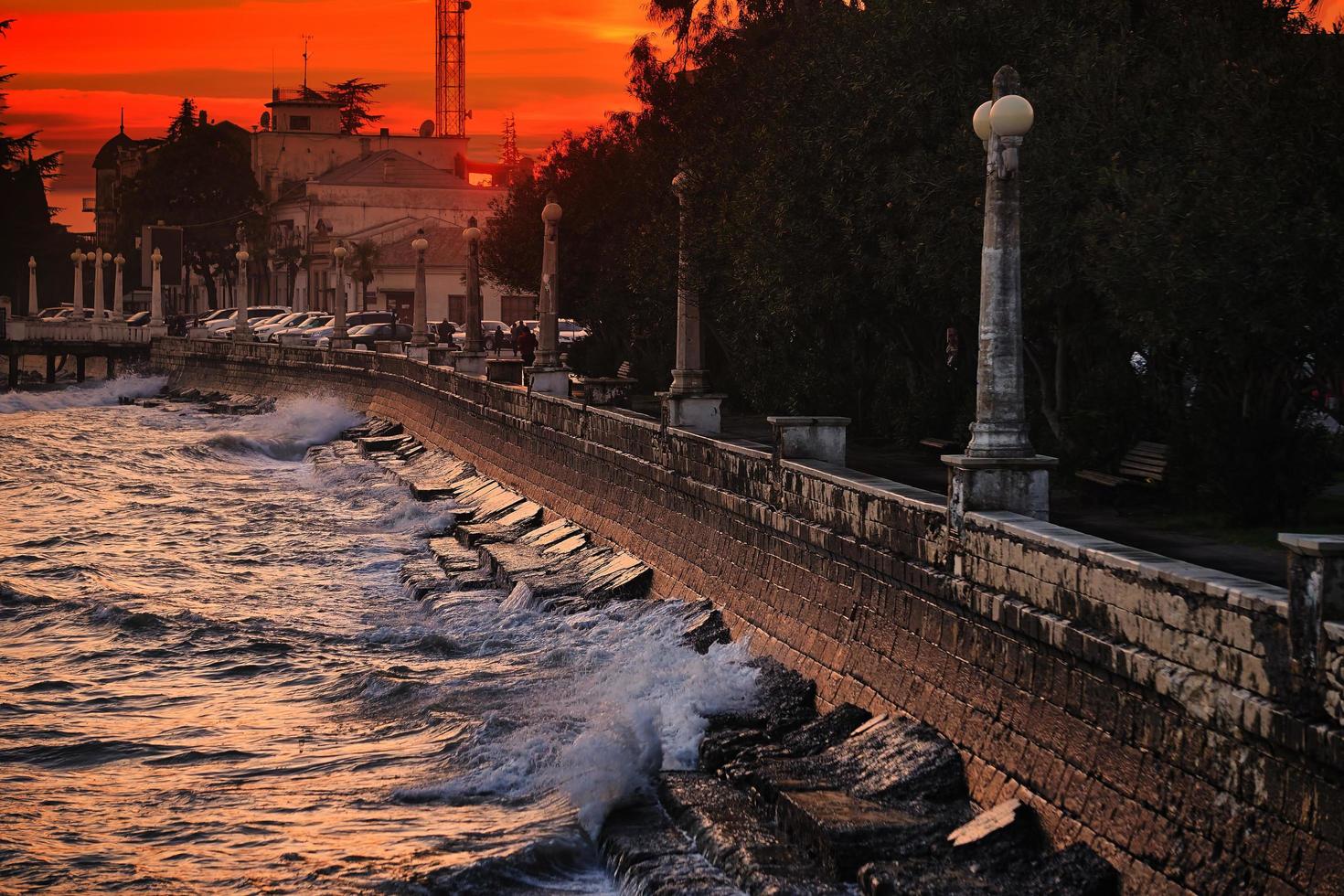 Cityscape with a view of the Sukhumi embankment at sunset, Abkhazia photo