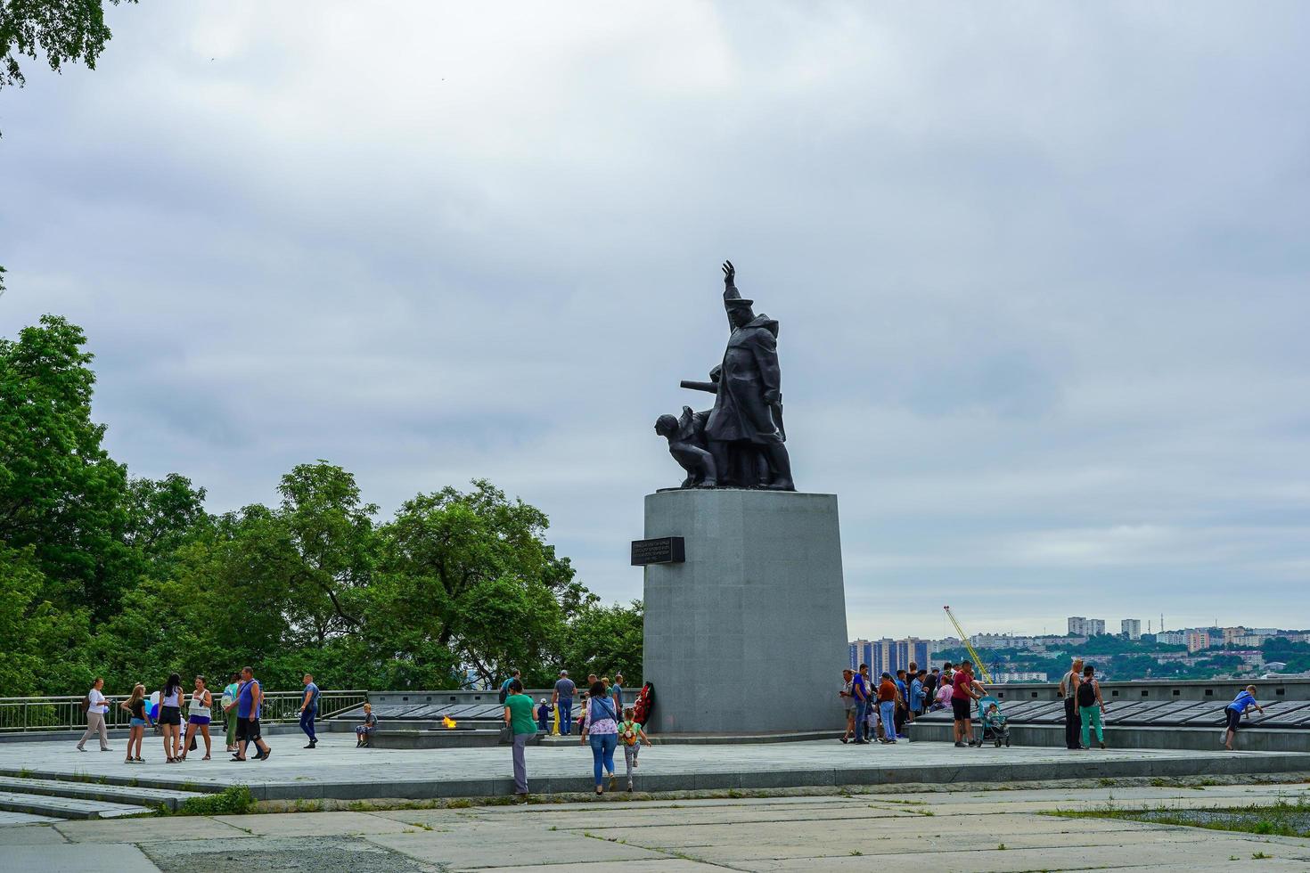Vladivostok, Russia - July 26, 2020 - Urban landscape with a view of the monument. photo