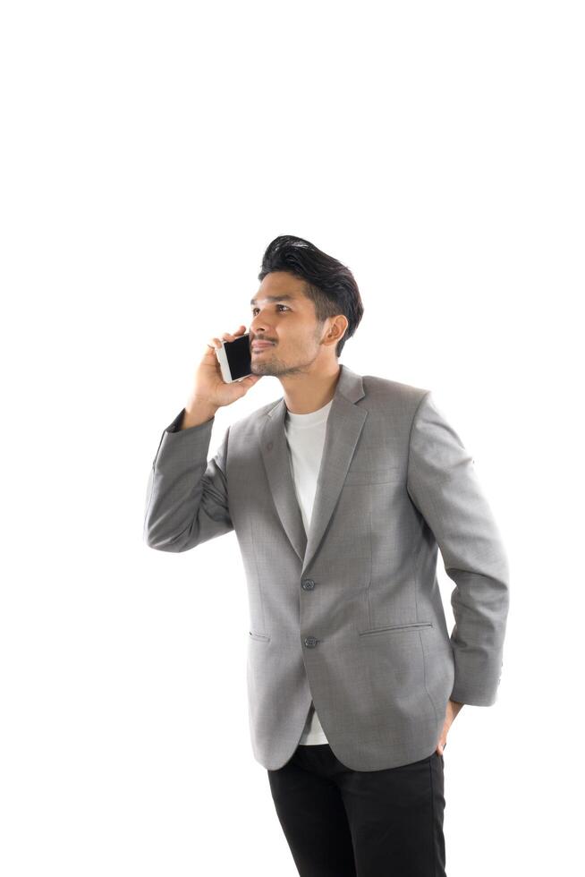 Businessman hipster holding coffee and talk on the phone isolated white background. photo