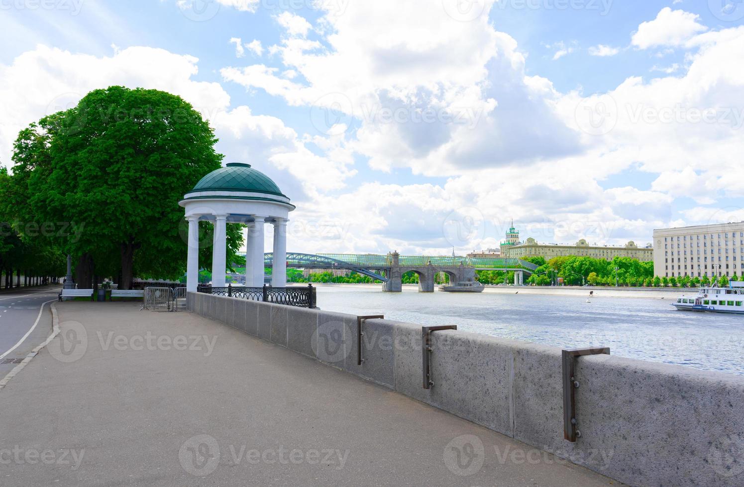 Moscow spring 2021 Andreevsky Bridge over the Moscow River. Gorky Park Rotunda on the embankment. photo