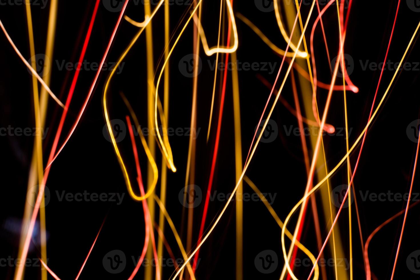 Abstract light bulbs on a dark background. Photo effect.