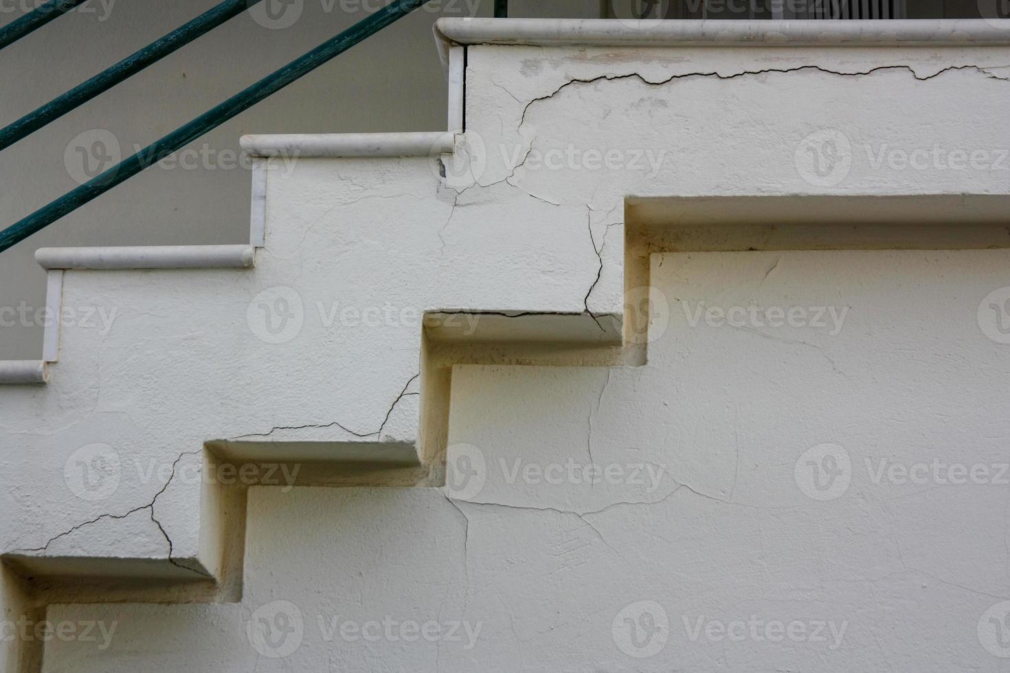 Old cracked damaged stairs from recent earthquake photo