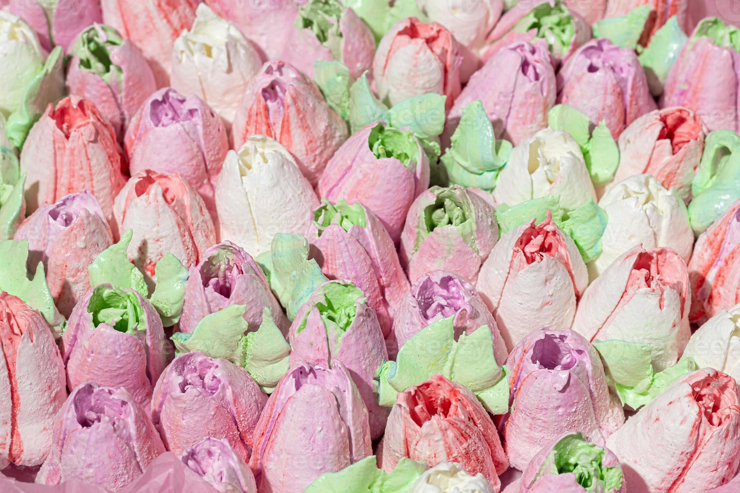 Handmade marshmallows in wooden packages on a light background with flowers. The concept of the holidays Women's Day and Valentine's Day. photo