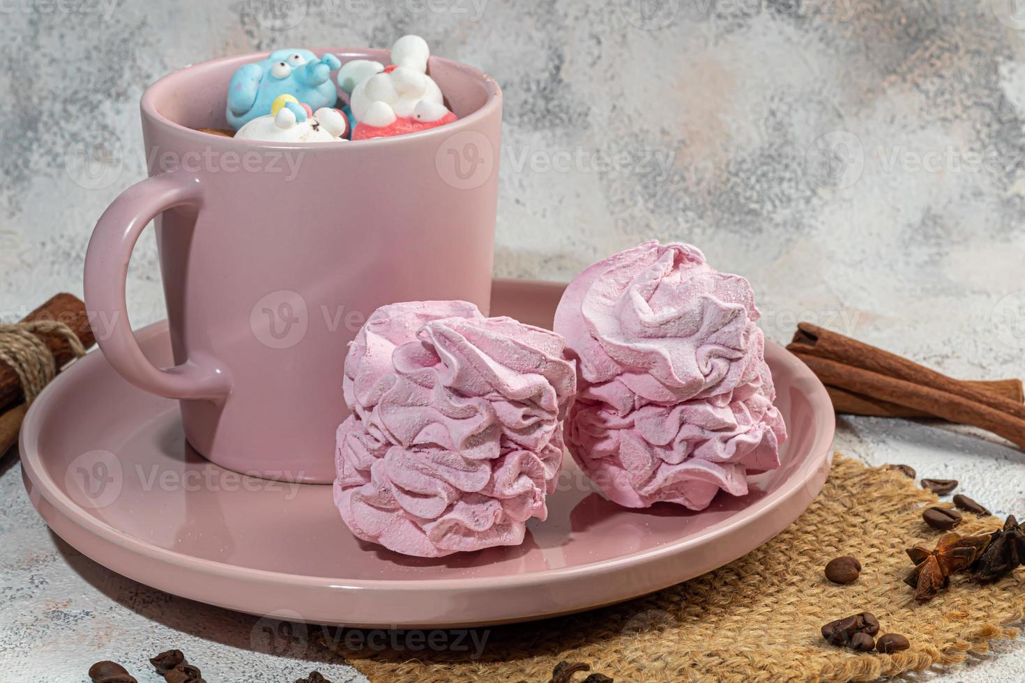 Marshmallow in the form of handmade animals on a light background. In a cup of coffee. Women's Day, Valentine's Day. photo