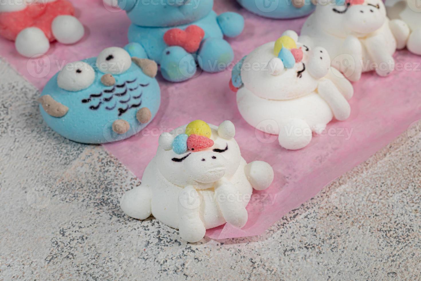 Marshmallow in the form of handmade animals on a light background. In a cup of coffee. Women's Day, Valentine's Day. photo