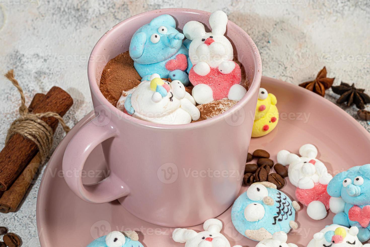 Marshmallow in the form of handmade animals on a light background. In a cup of coffee. Women's Day, Valentine's Day. photo