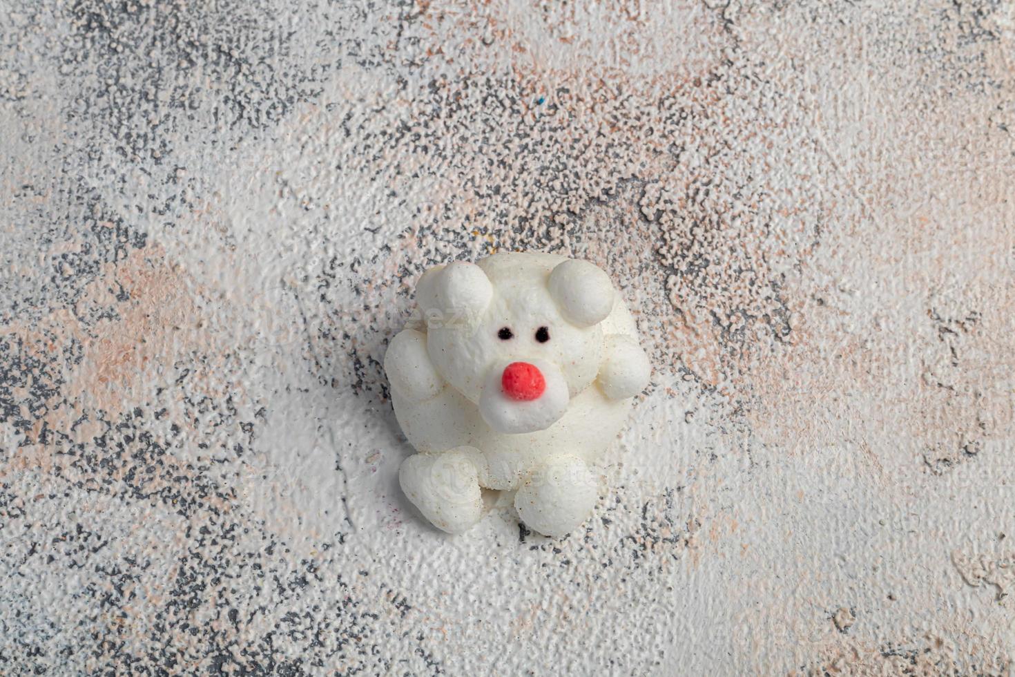Marshmallow in the form of handmade animals on a light background. In a cup of coffee. Women's Day, Valentine's Day. photo