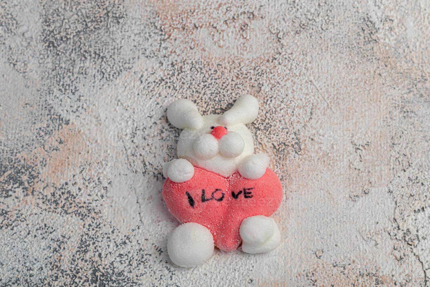Marshmallow in the form of handmade animals on a light background. In a cup of coffee. Women's Day, Valentine's Day. photo
