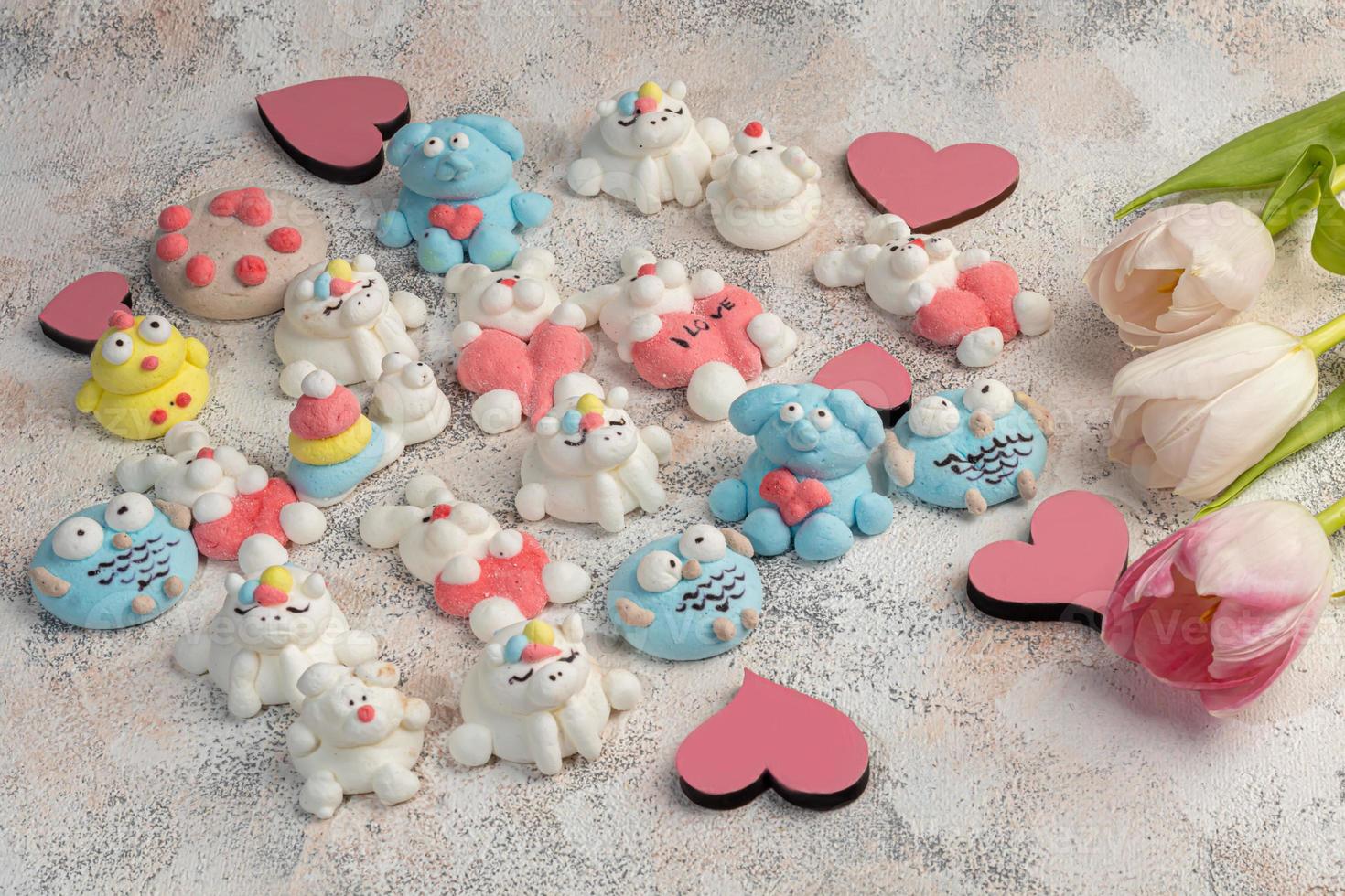 Marshmallow in the form of handmade animals on a light background. In a cup of coffee. Women's Day, Valentine's Day. photo