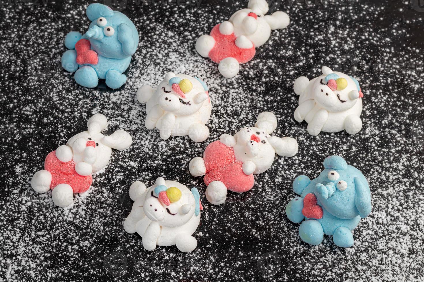Marshmallow in the form of handmade animals on a light background. In a cup of coffee. Women's Day, Valentine's Day. photo