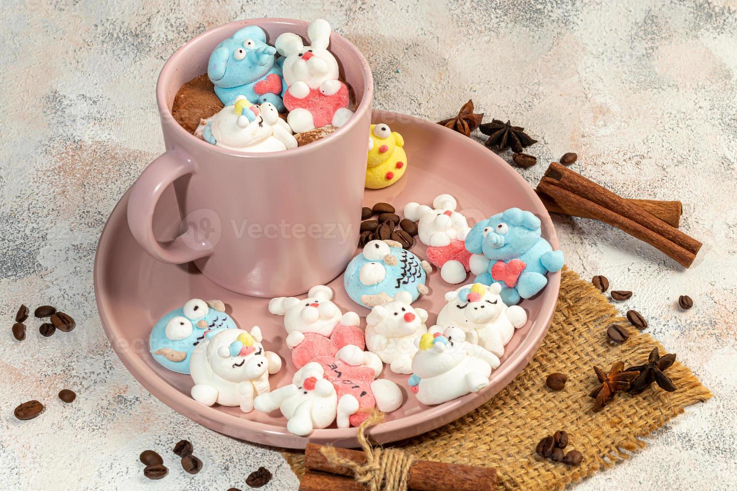 Marshmallow in the form of handmade animals on a light background. In a cup of coffee. Women's Day, Valentine's Day. photo