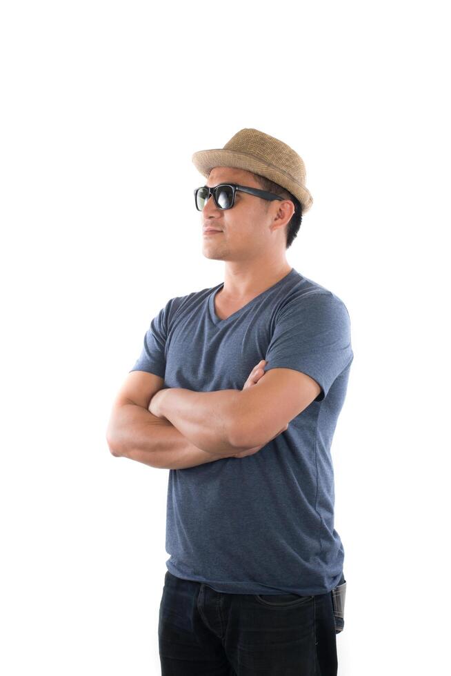 Portrait of young hipster man wearing blue t-shirt hat with head at camera on isolated over white studio background. photo