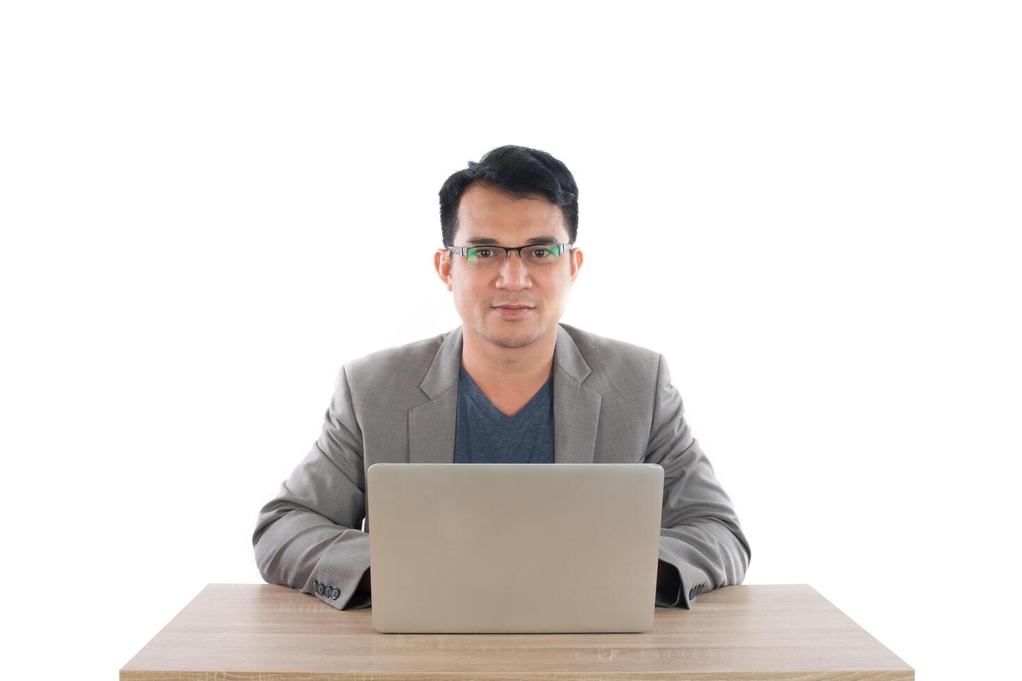 Portrait of  businessman with laptop isolated on white background. photo