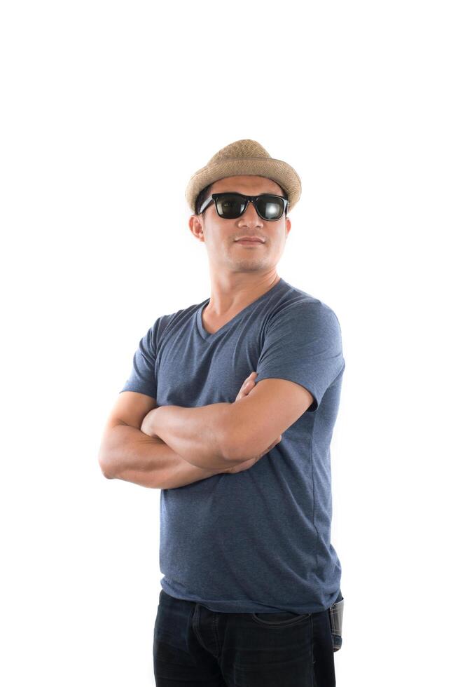 Portrait of young hipster man wearing blue t-shirt hat with head at camera on isolated over white studio background. photo