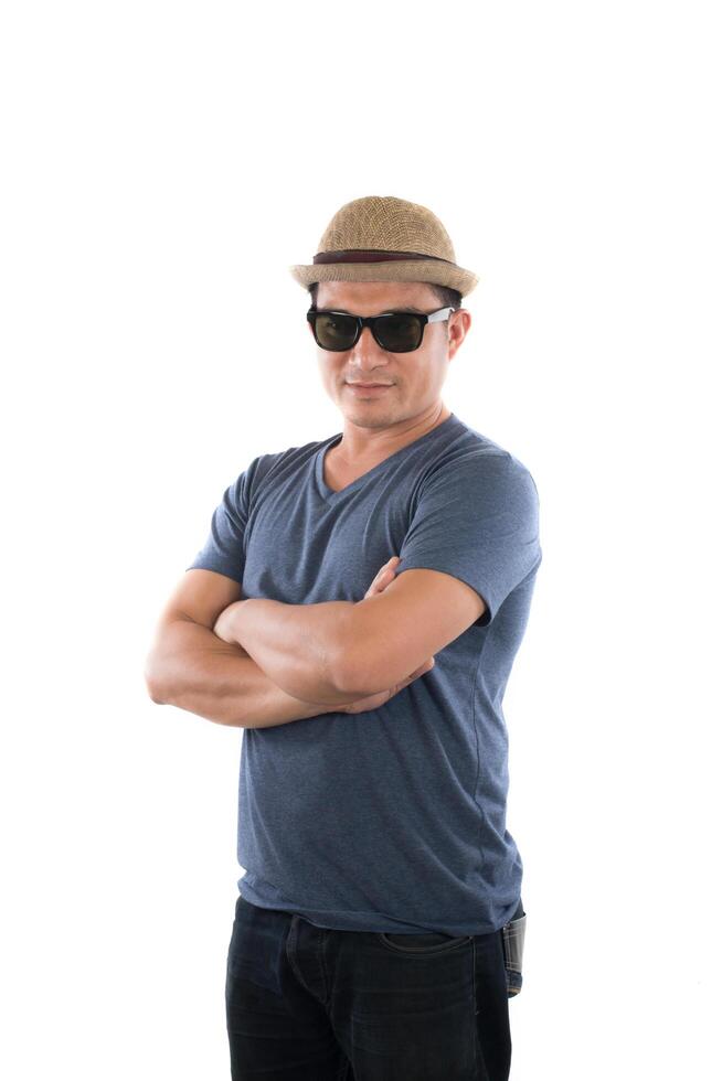 Portrait of young hipster man wearing blue t-shirt hat with head at camera on isolated over white studio background. photo