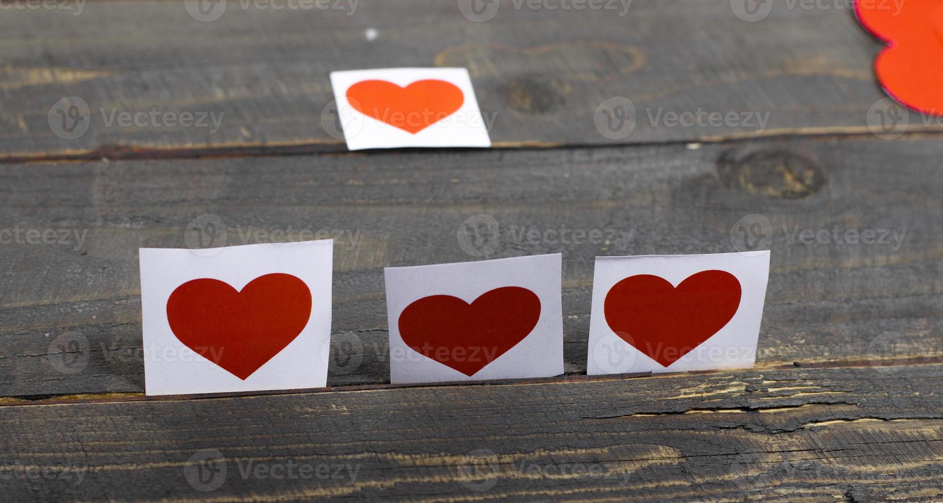 Happy Valentines day, paper hearts on wooden background with lights background photo