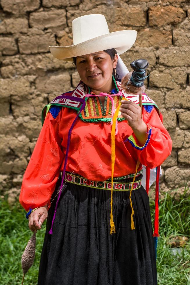 Peruvian andean womans posing in diferents actions photo