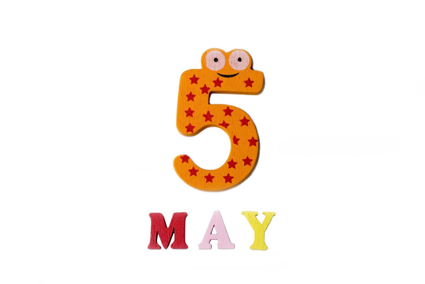 Numeral five and the word may on a white background. photo