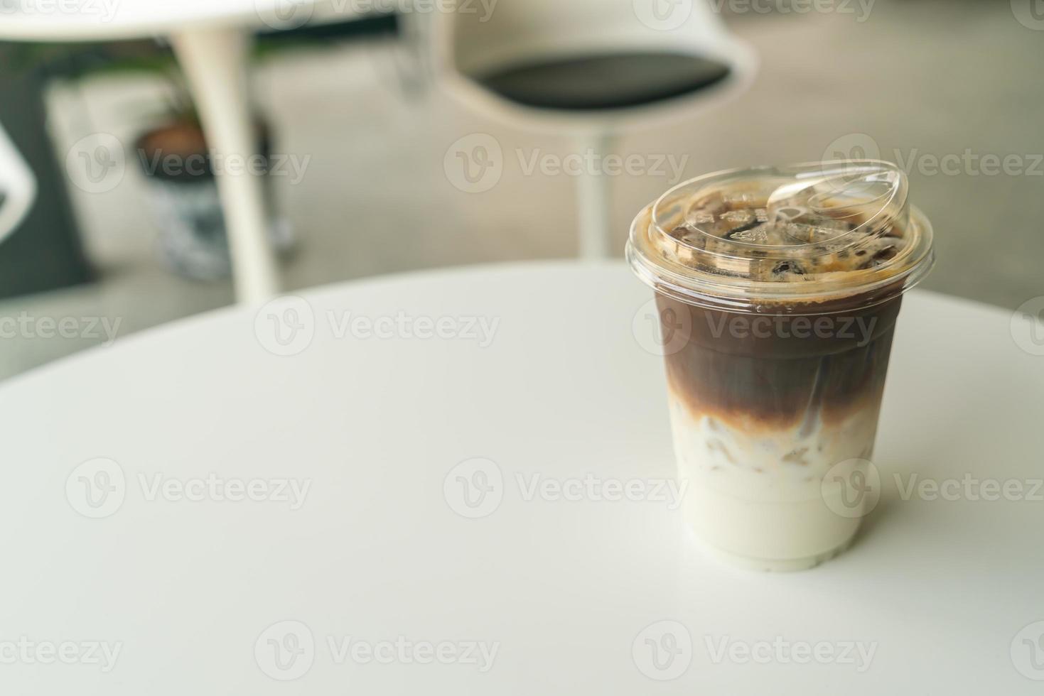 iced latte coffee cup on table photo