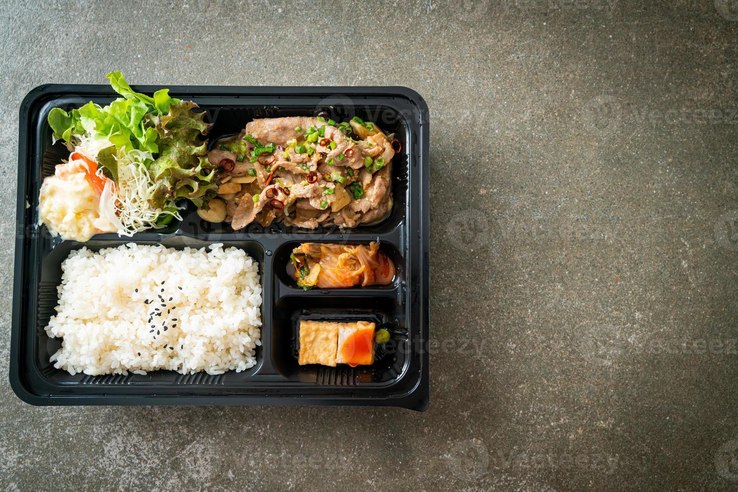 Japanese rice with pork yaki bento set photo