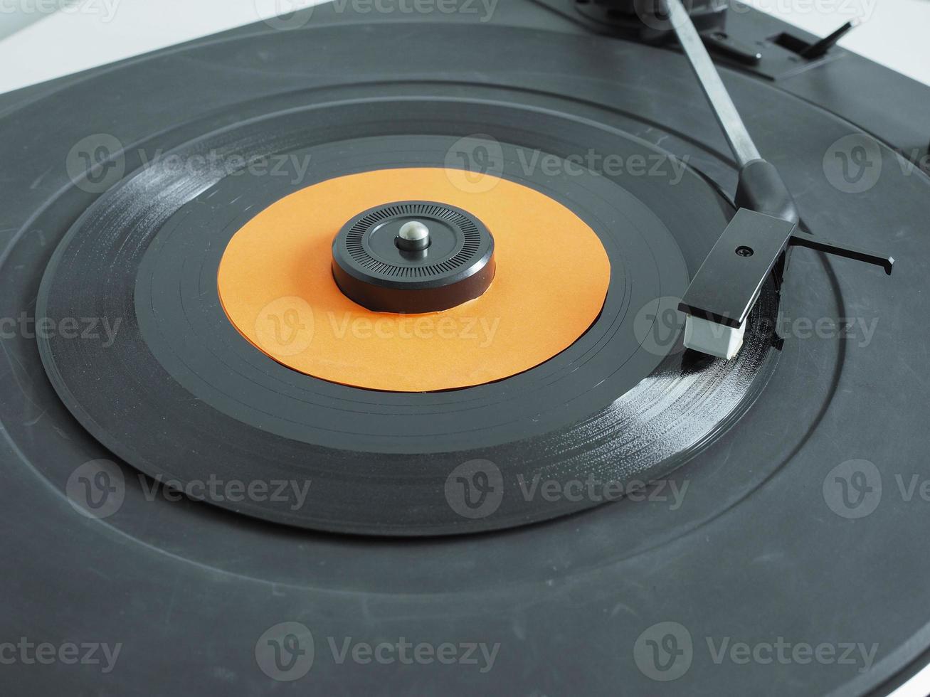 Vinyl record on turntable photo