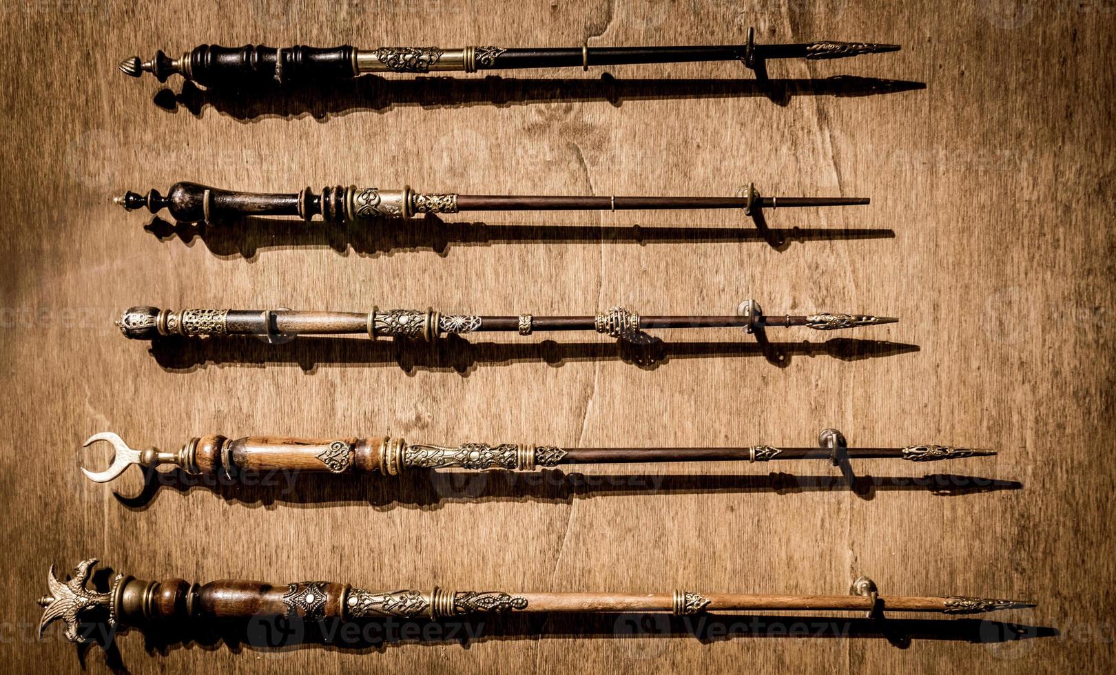 Black magic wands. Abstract concept for fantasy, mystery, sorcery photo