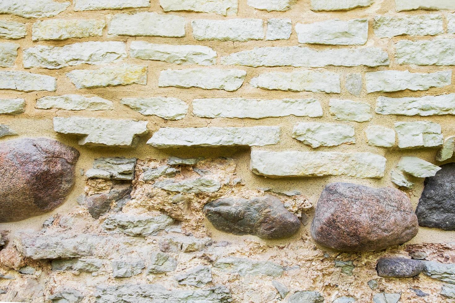 Fragment of an ancient medieval fortress wall photo