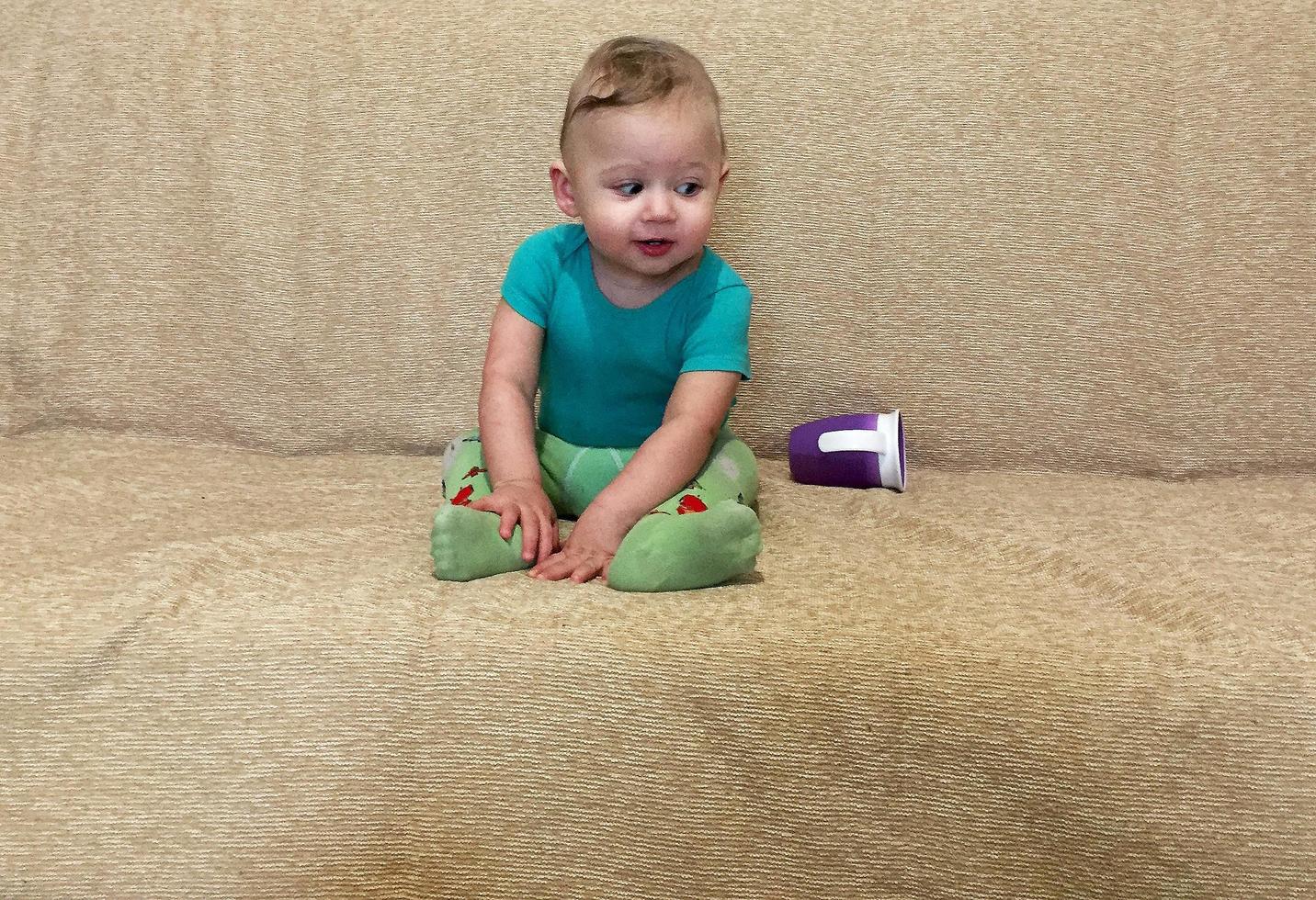 Beautiful baby boy with child face posing photographer photo