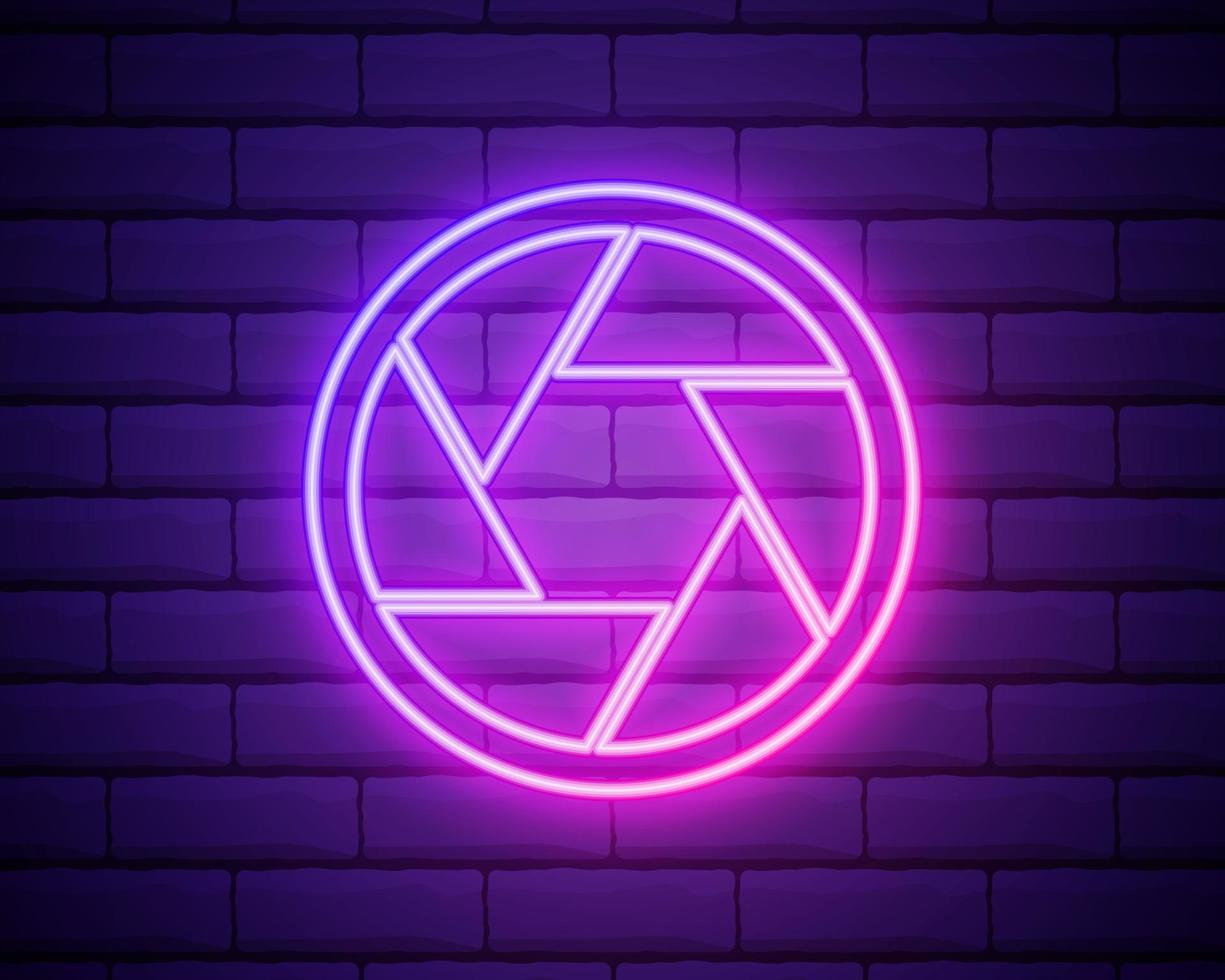 camera objective. simple silhouette. Neon style. Light decoration icon. Bright electric symbol isolated on brick wall. vector