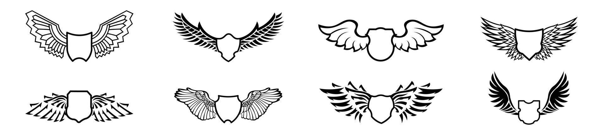 Set of blank  shields with wings,   Set of heraldic winged shields in different shapes with bird vector