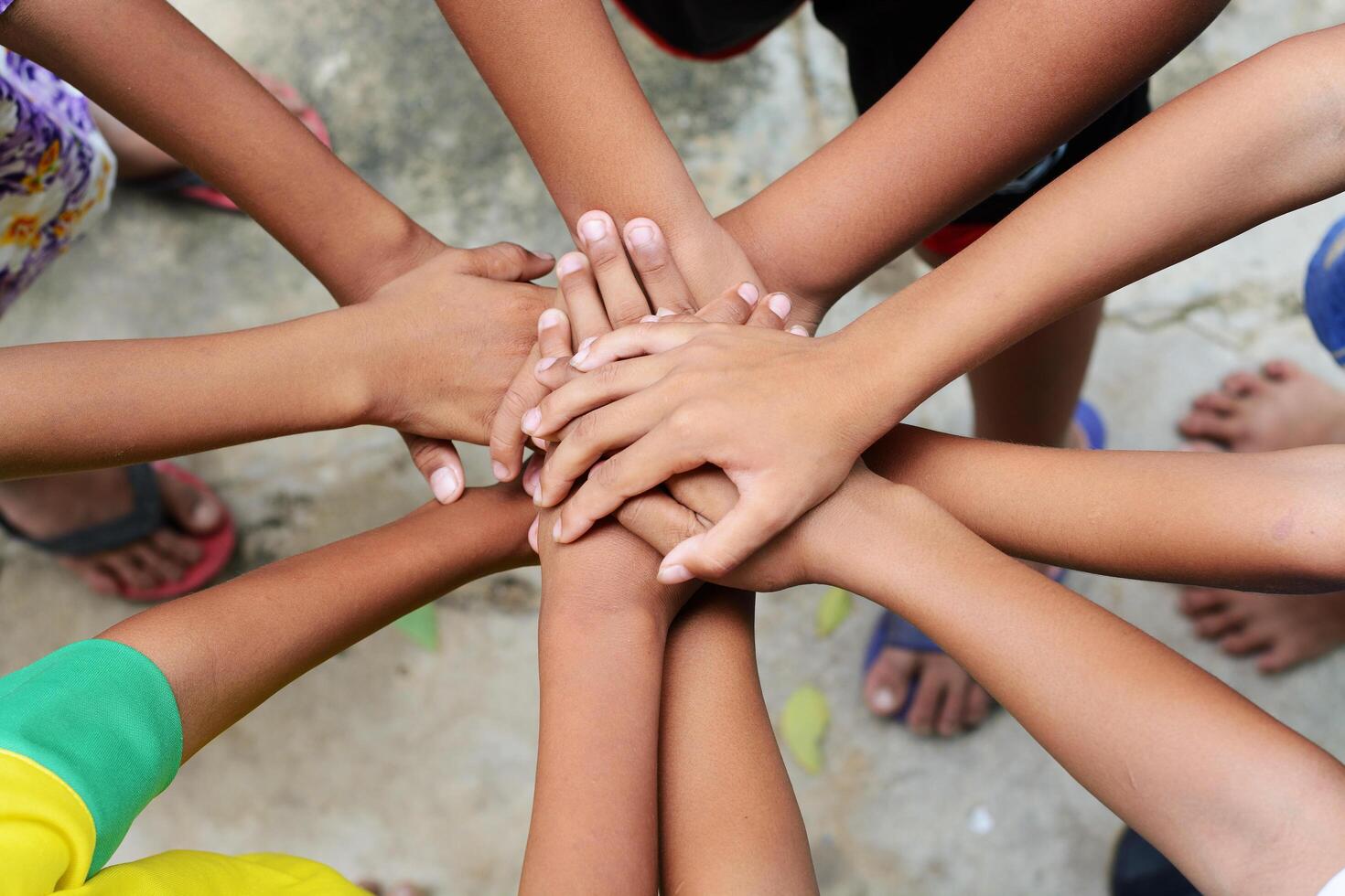 Group of hands holding together photo