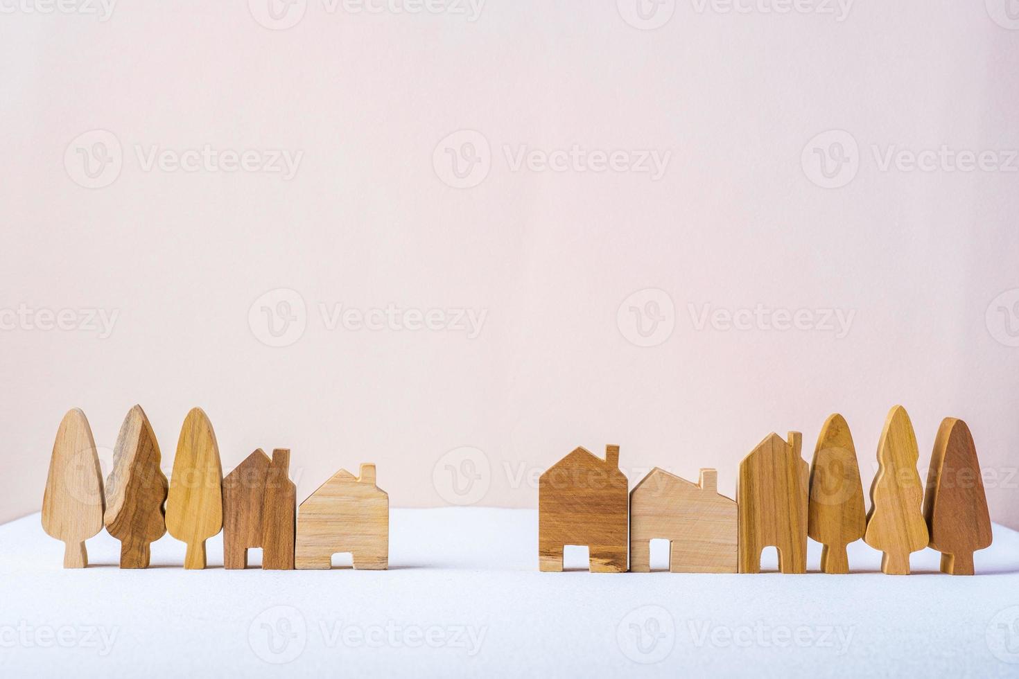 group of wood home toy shape on white table peach background photo