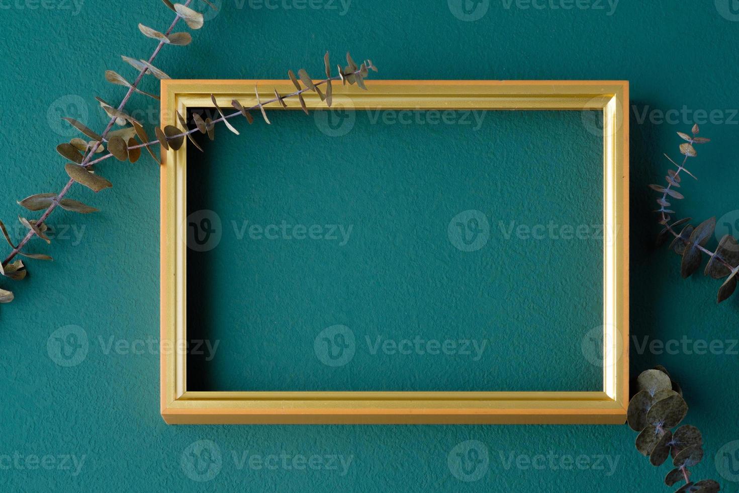 mock up frame on green table photo