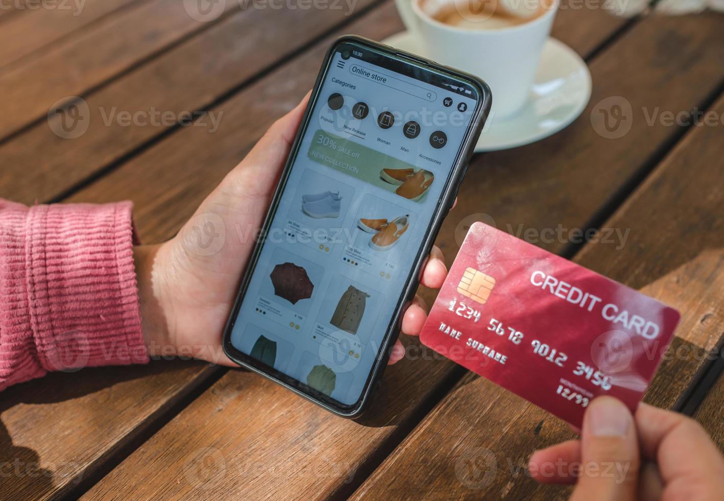 asian woman shopping online with credit card photo