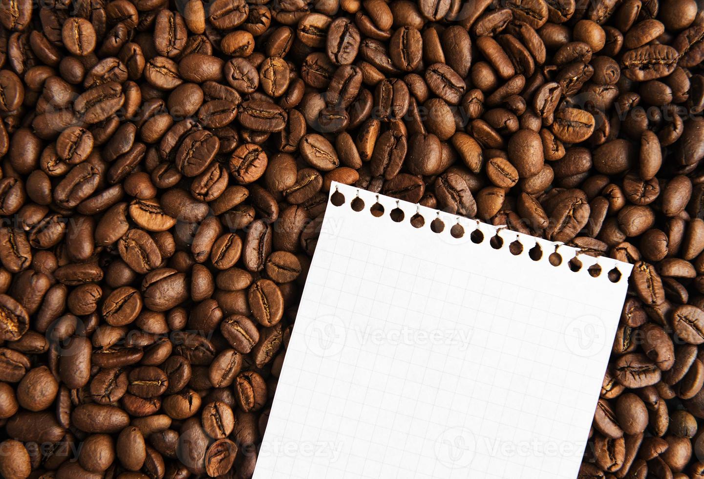 Note on the background of coffee beans photo