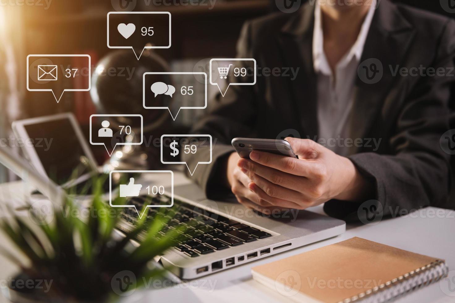 Social media and Marketing virtual icons screen concept.close up of businesswoman typing keyboard with laptop photo